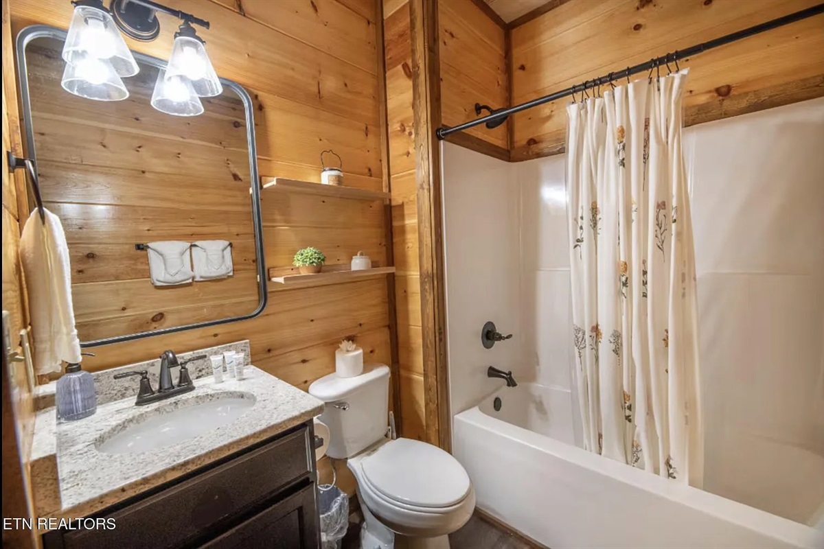 The third full bathroom at Marigold Cabin rounds out a complete and comfortable stay for every guest. Three full bathrooms across this 3-bedroom Pigeon Forge cabin rental means your group will always have the convenience and privacy that makes a vacation