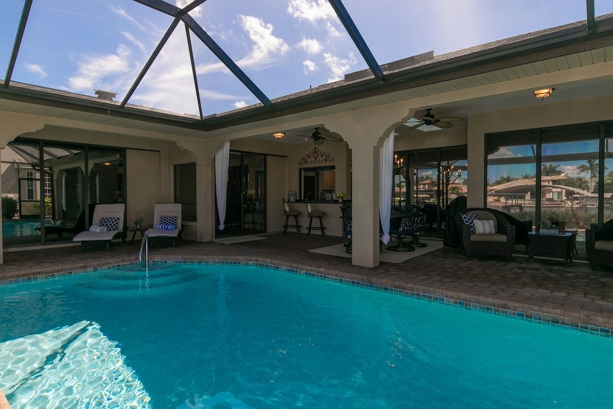Swim, lounge, and relax in the comfort of your screened pool area