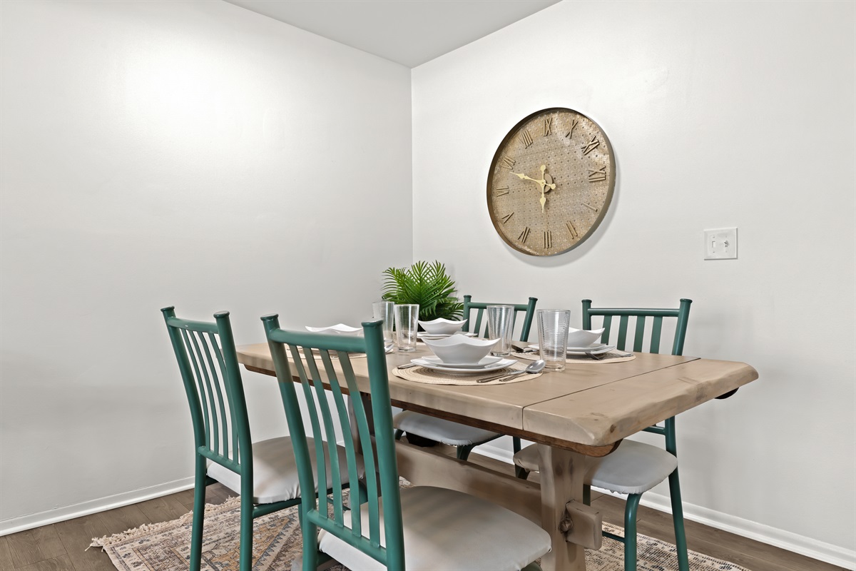 Gather for breakfast, lunch, or dinner at this inviting dining space for four.
