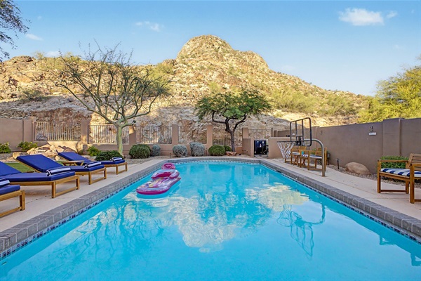 Amazing backyard mountain view oasis with private heated saltwater pool next to the mountain