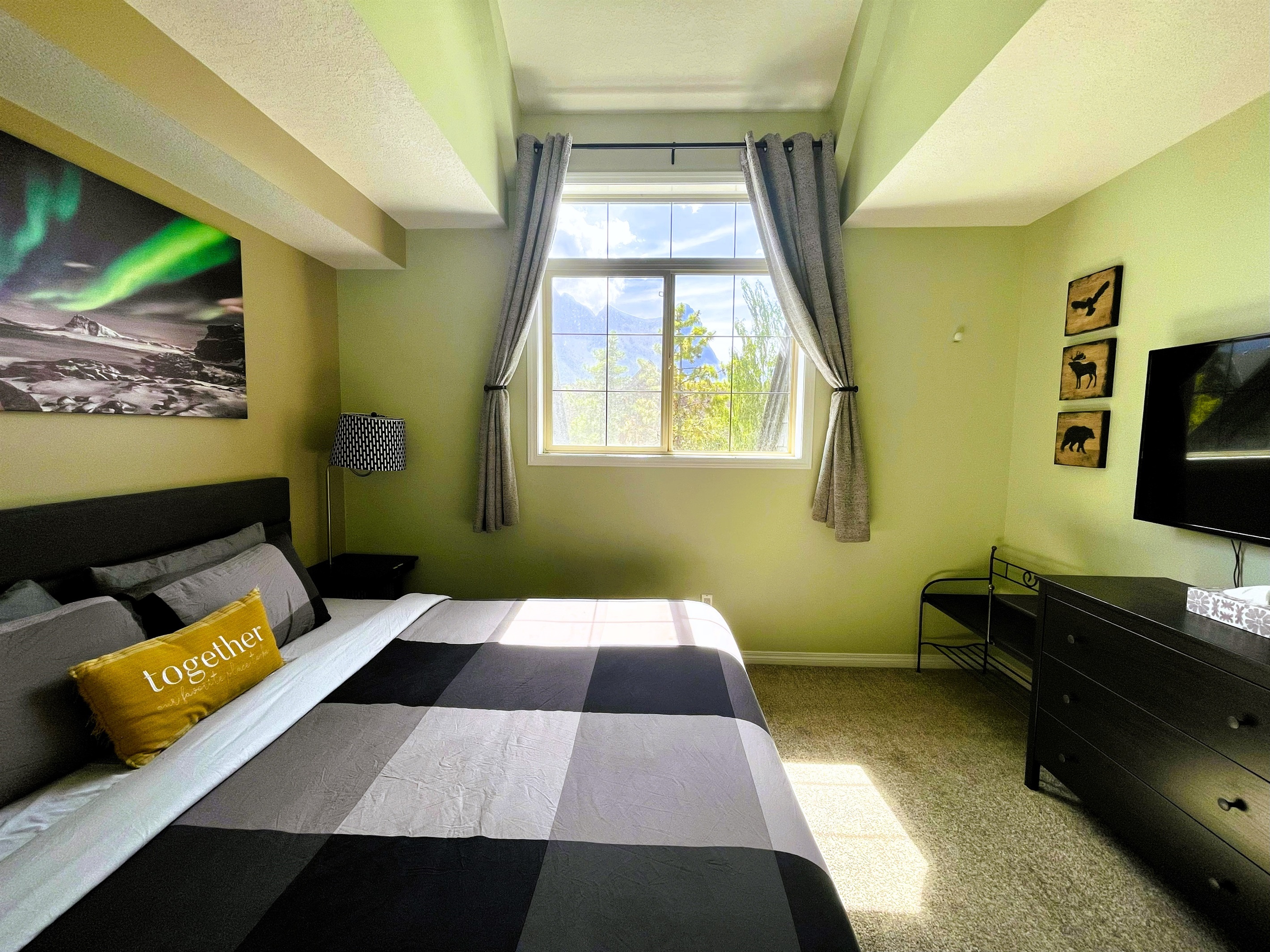 Check out the view from the window!  Master Bedroom with vaulted ceiling, attached ensuite bathroom.  50" TV with Netflix, Disney+. and Amazon Prime.  Located on the 2nd floor.