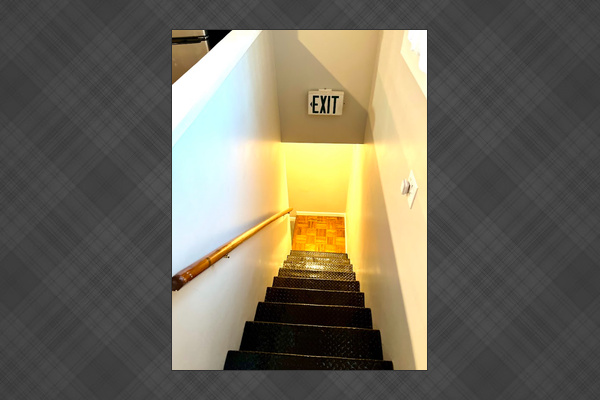 Williams Studio — Interior stairs leading to the upstairs apartment.