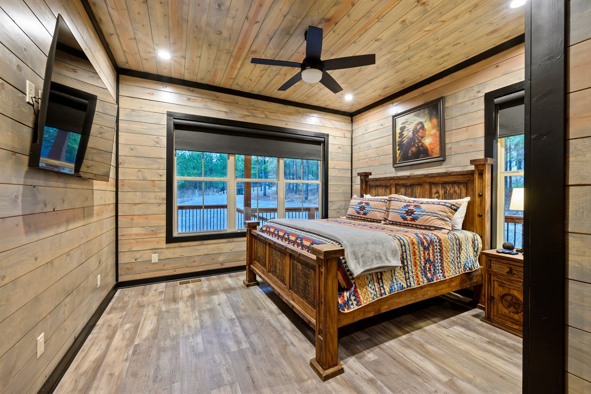 2nd king bedroom downstairs. Complete with Dish TV and bluetooth speaker.