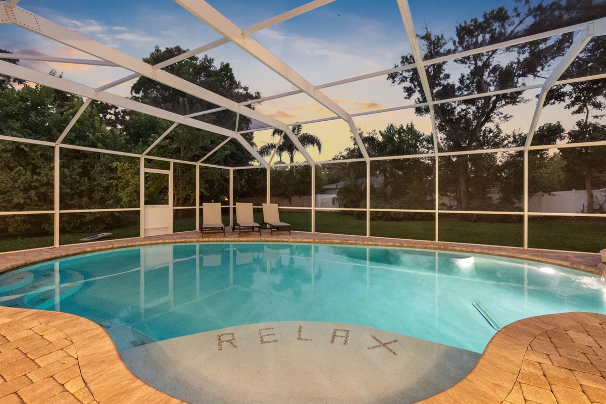 Whether it’s a refreshing swim or a cozy soak, this pool and spa area delivers.