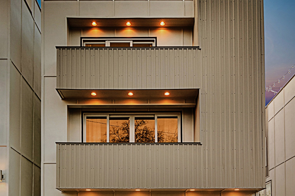 The property is 4 stories and each level has a walkout balcony with downtown views