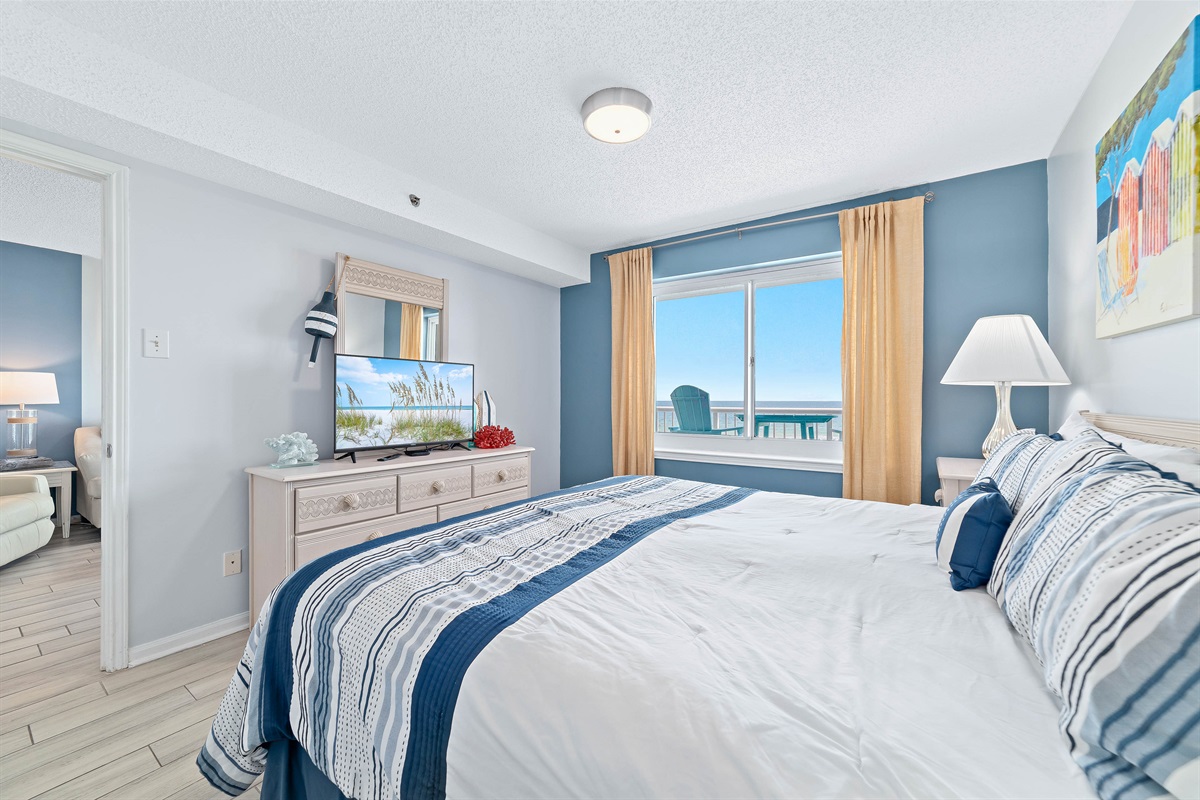 A welcoming and stylish Primary bedroom designed for restful nights. The comfortable bedding and thoughtful decor create a serene retreat.