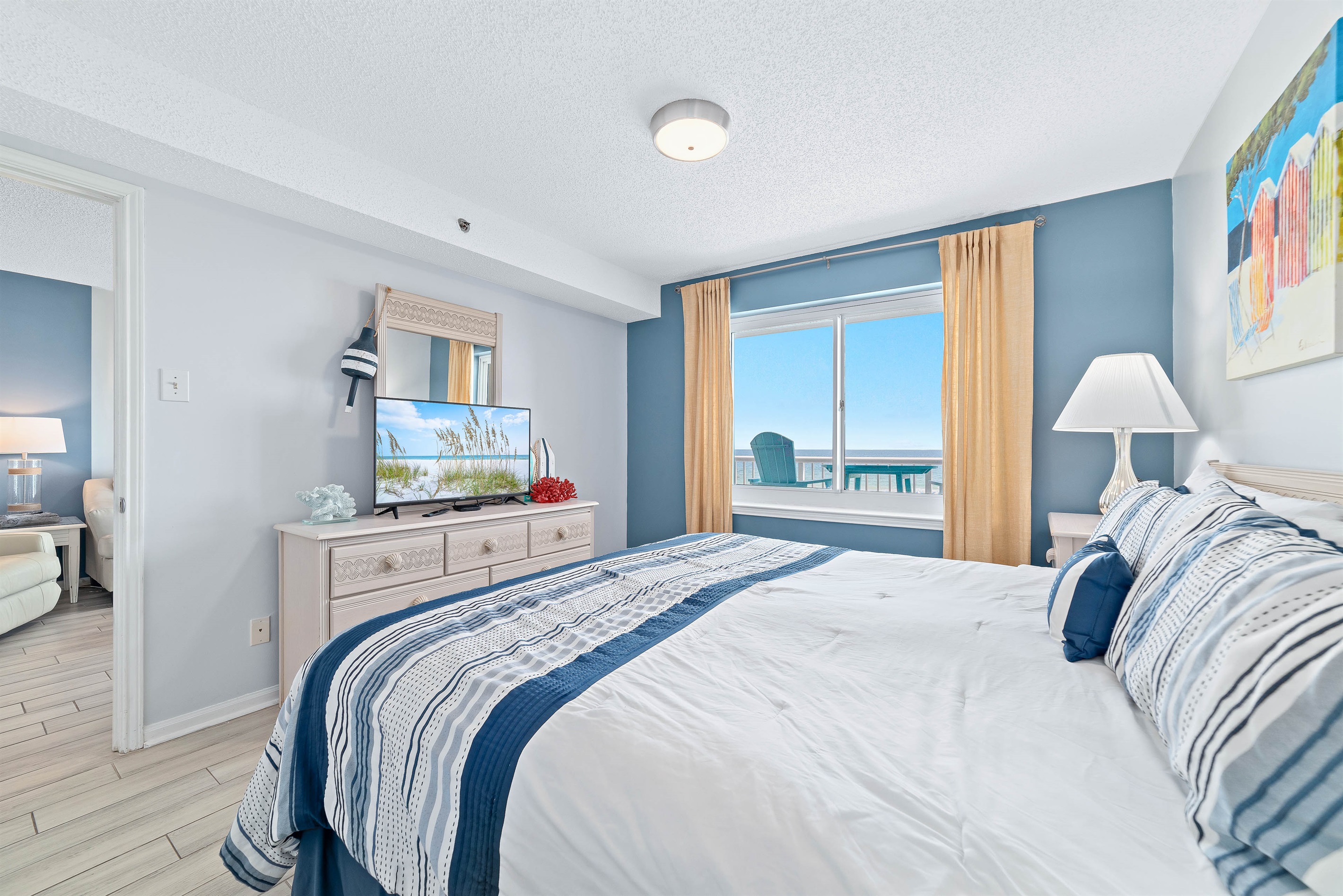 A welcoming and stylish Primary bedroom designed for restful nights. The comfortable bedding and thoughtful decor create a serene retreat.