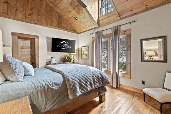 Bedroom 2: This inviting queen bedroom offers soft linens, natural light, and tranquil views, making it the perfect spot to recharge after a day of adventure