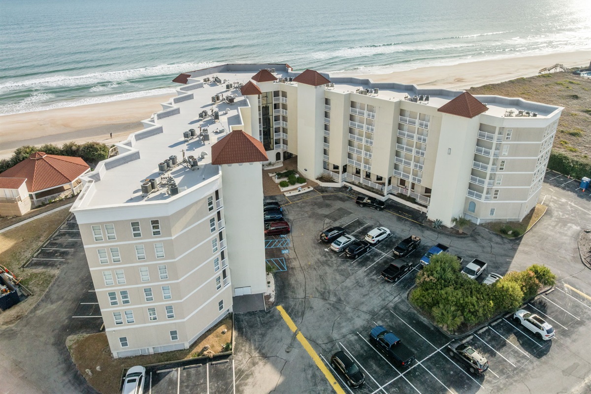 Aerial view of St. Regis, highlighting the courtyard layout and proximity to the ocean