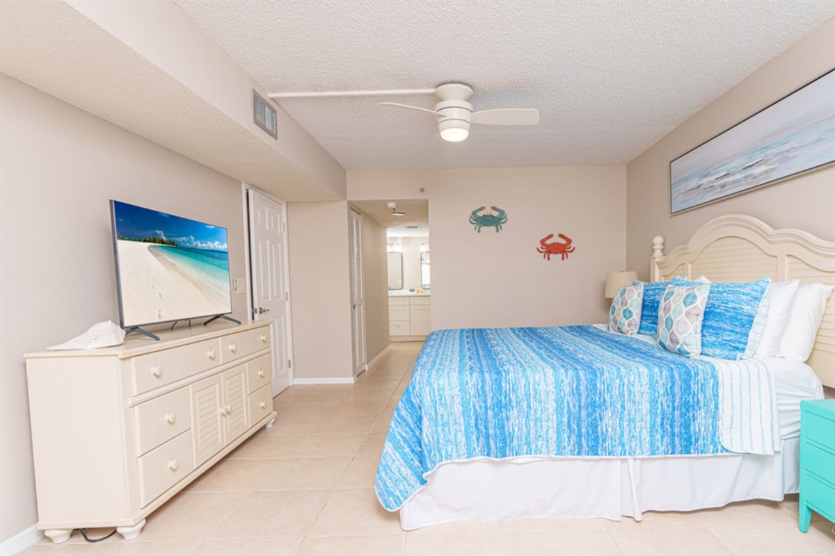 King suite with 50-inch Smart TV and dedicated work space.