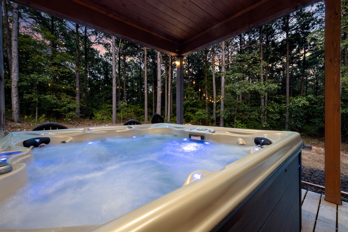 Private outdoor hot tub ideal for soaking, relaxing, and enjoying peaceful evenings under the stars.