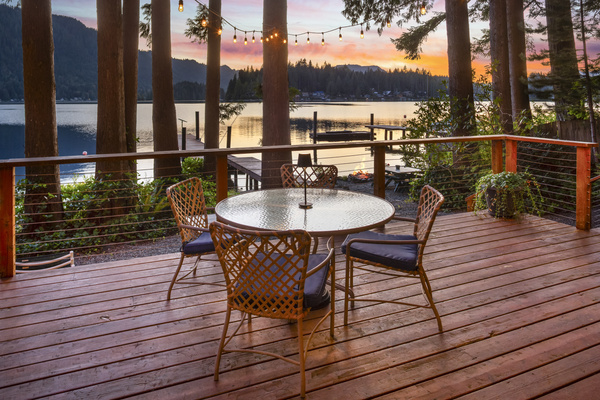 Lakeside patio with table for 4 guests