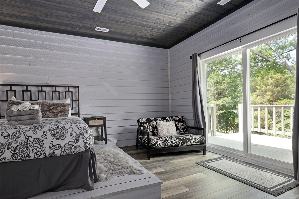 Bedroom 1 with Queen bed, access to deck and ensuite bathroom