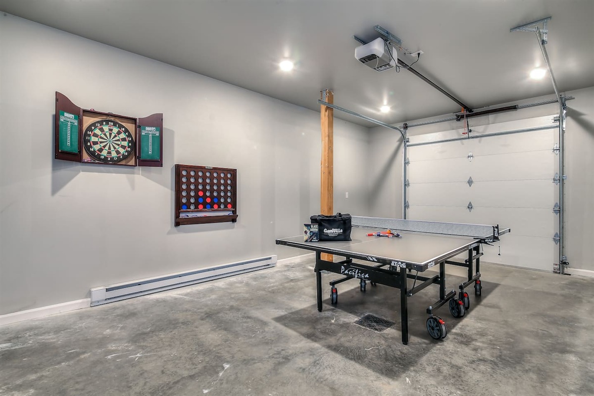 Full-sized Ping Pong table, Darts, Connect Four, Giant Jenga, Elliptical machine, and a Newly Added Arcade Console!