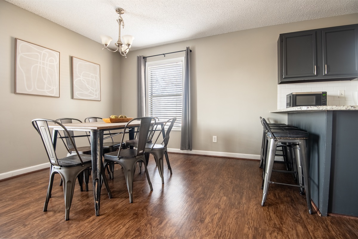 There is plenty of seating in Unit C's dining area with both the dining table (6 seats) and the bar seating (4 seats)!