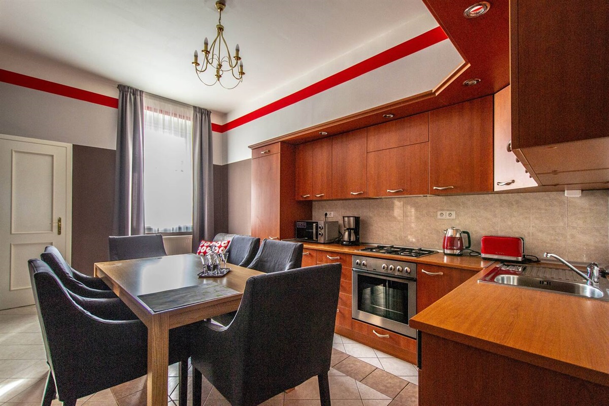 Apartment is 85 m2 big. It has a modern kitchen with a dining area. Armchairs are super comfy!