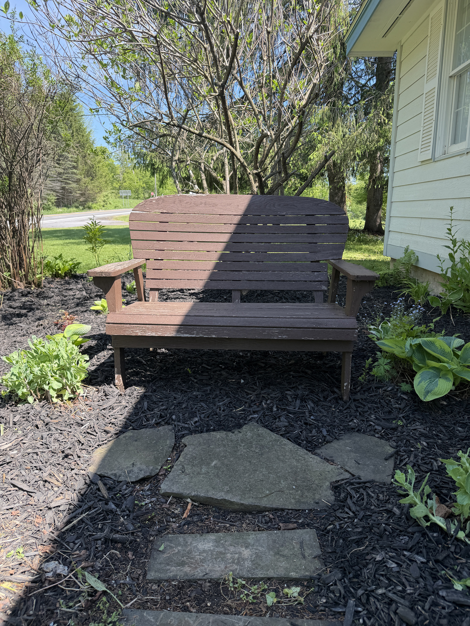 Bench to enjoy the gardens at Changing Seasons