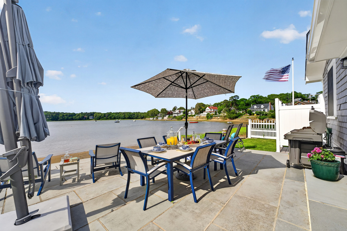 A wonderful space for outdoor dining, relaxing, and enjoying the waterfront atmosphere.