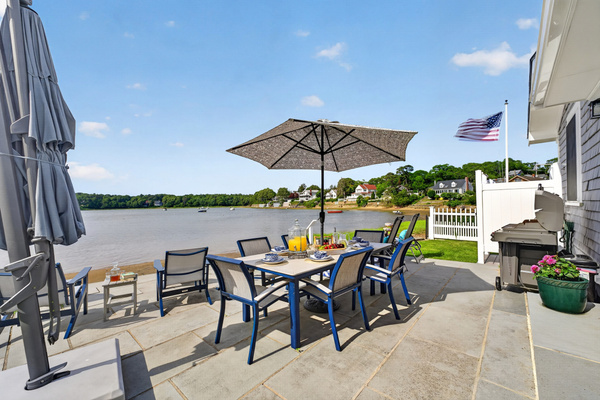A wonderful space for outdoor dining, relaxing, and enjoying the waterfront atmosphere.