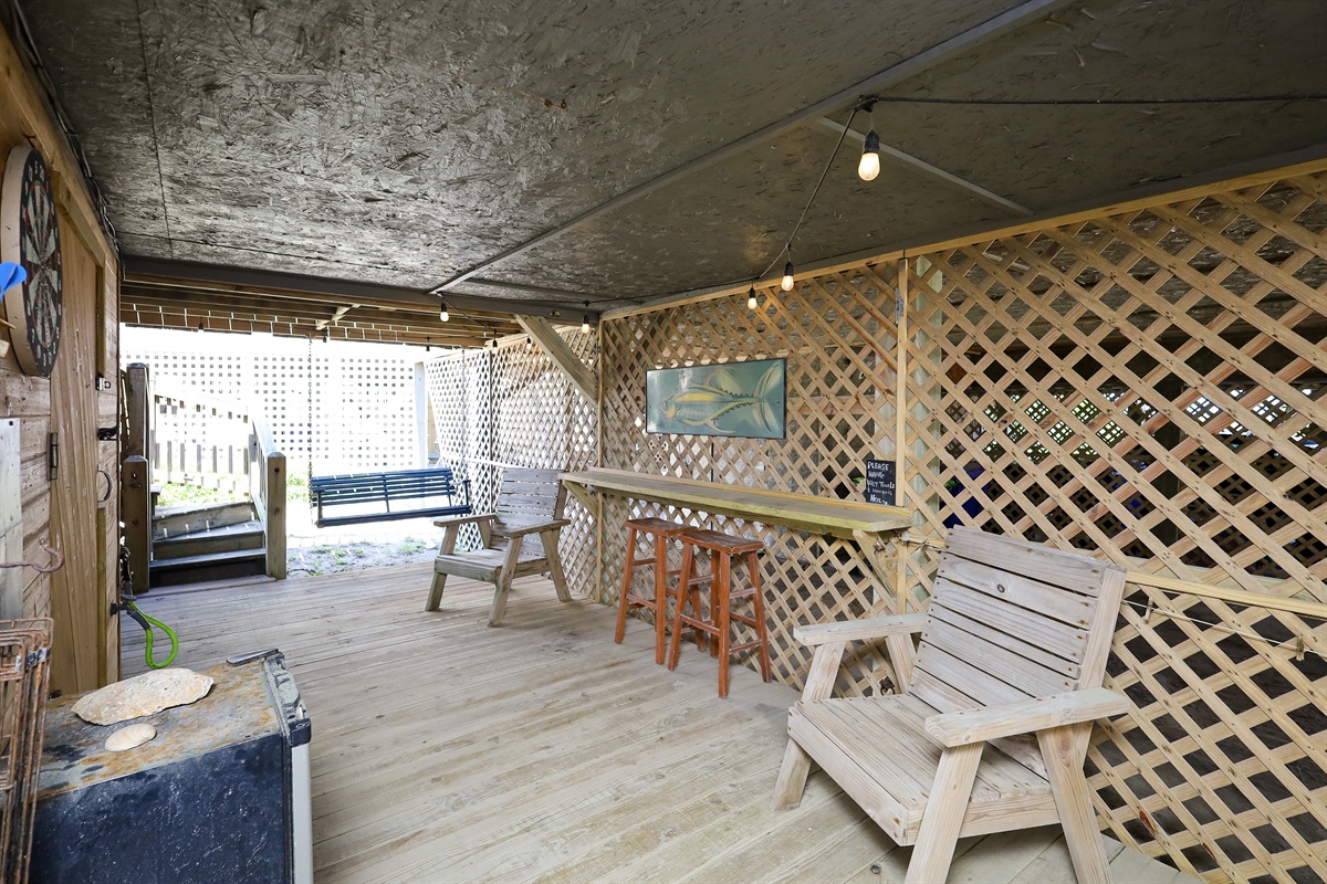 Casual seating in the carport area