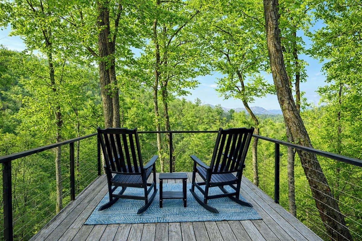 Two rocking chairs, endless mountain views. Sit back, slow down, and take in the long-range ridge line from your private lookout point at Wrigs Ridge.