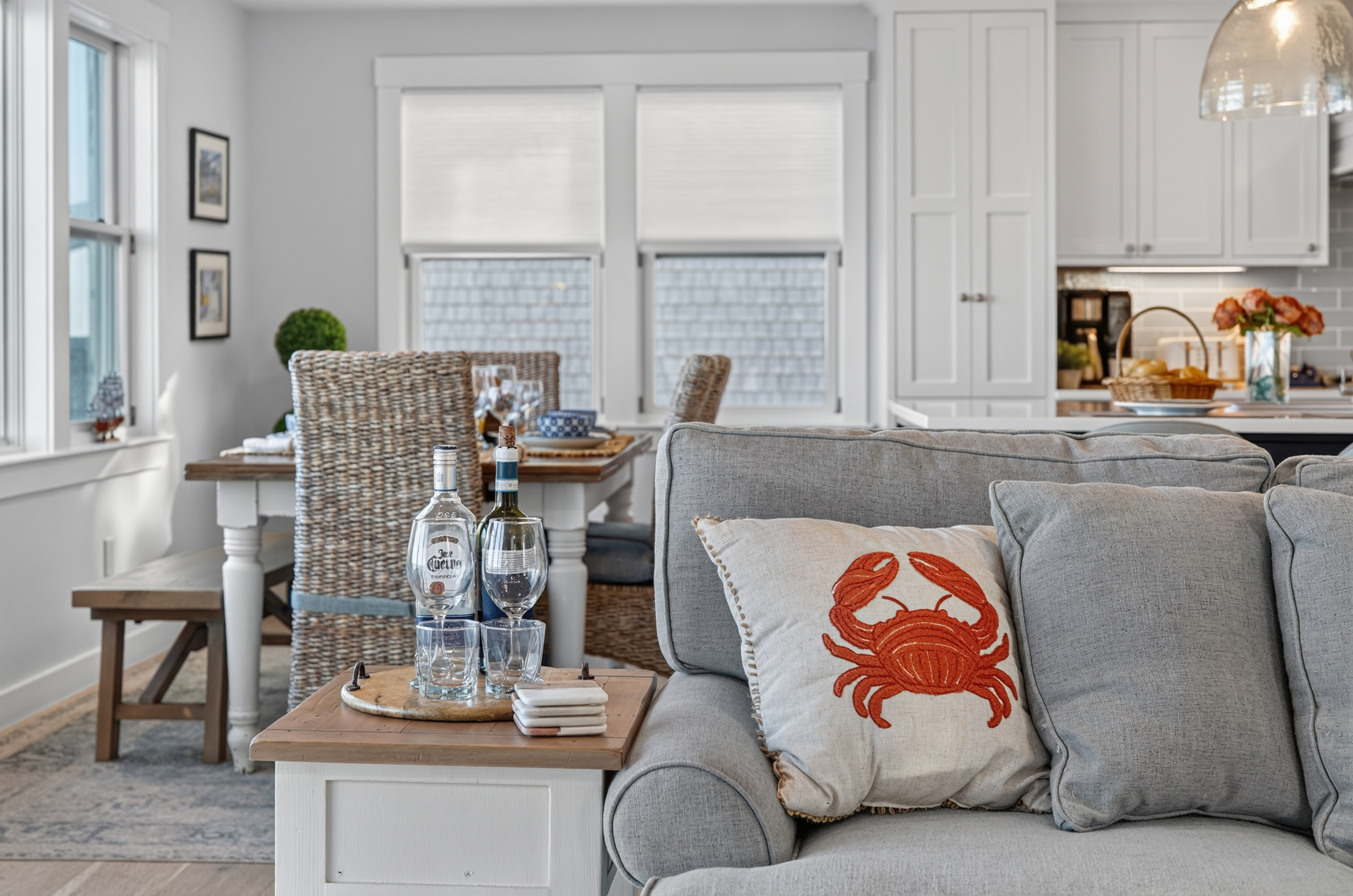 Comfortable seating area connecting the living room and dining space with ocean views