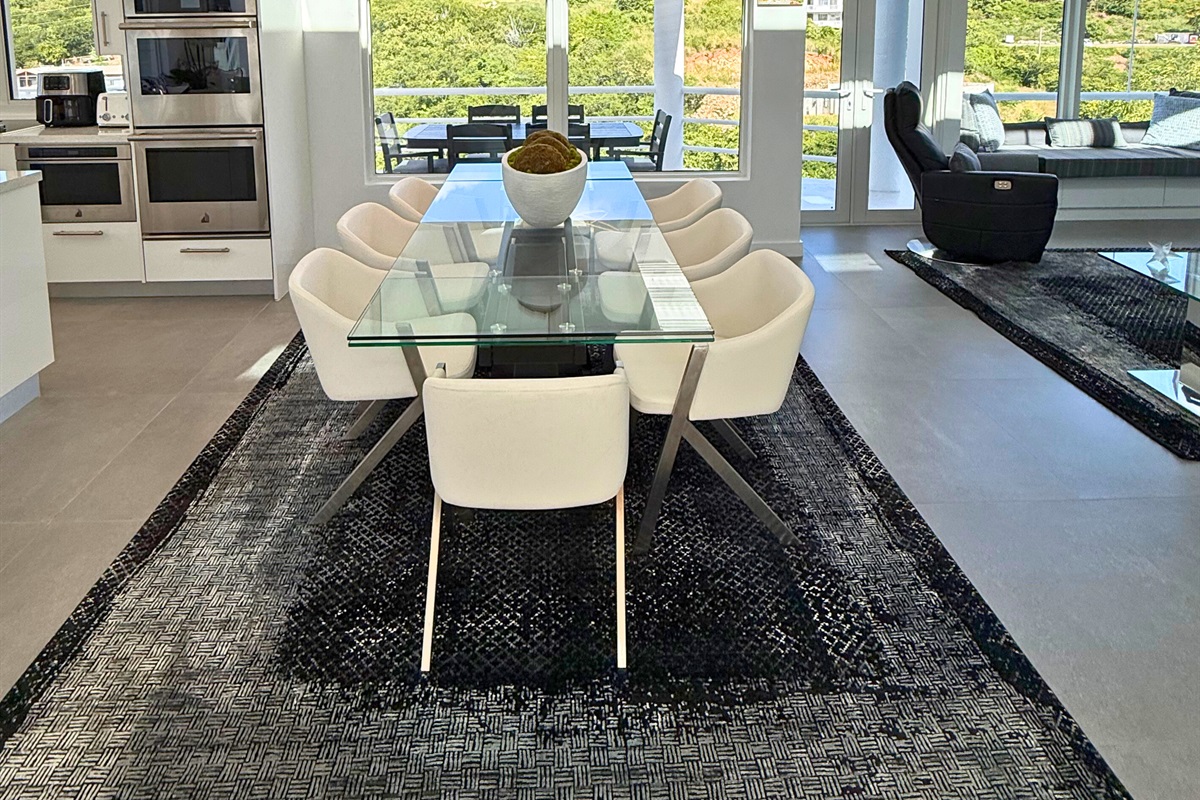 Large dining table with seating for 8