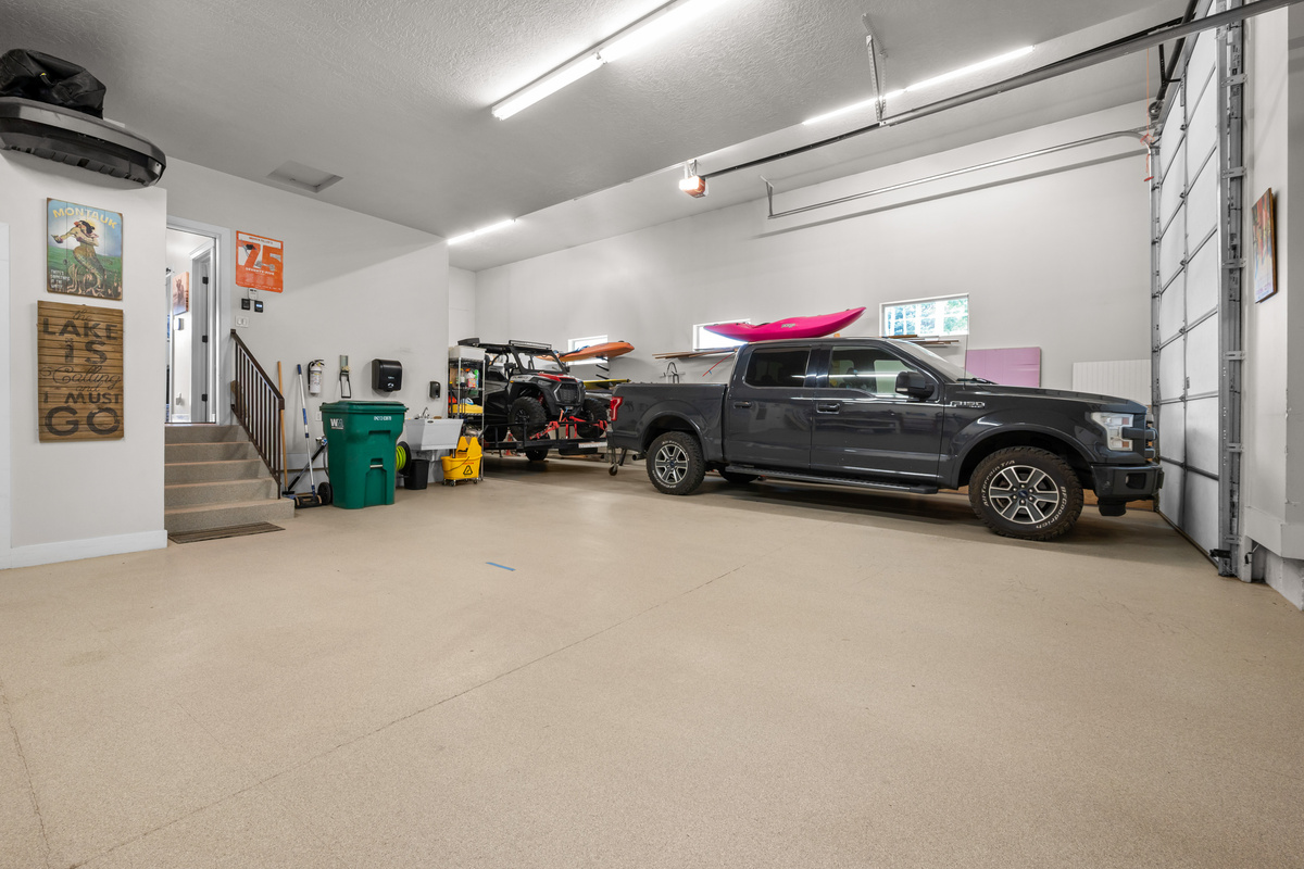 Oversized heated garage with plenty of space for vehicles, bikes, skis, kayaks, and all your outdoor adventure gear.