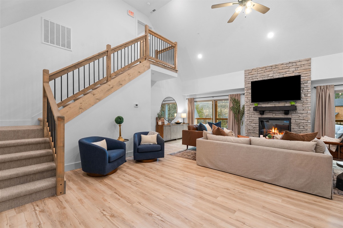 Warm living area with high ceilings and plenty of room to relax.
