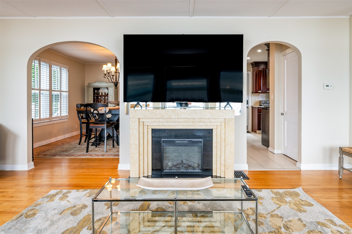 Relax in style with a large smart TV, elegant fireplace, and open layout perfect for gathering 🎬🔥🛋️