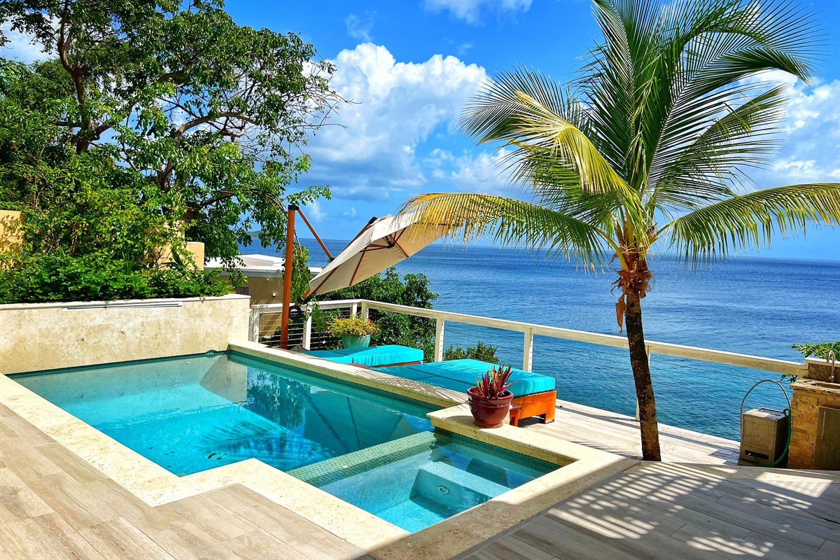 Step onto this pool deck and you'll never want to leave. Please note the area next to the pool is not a hot tub. The only water amenity offered is the pool