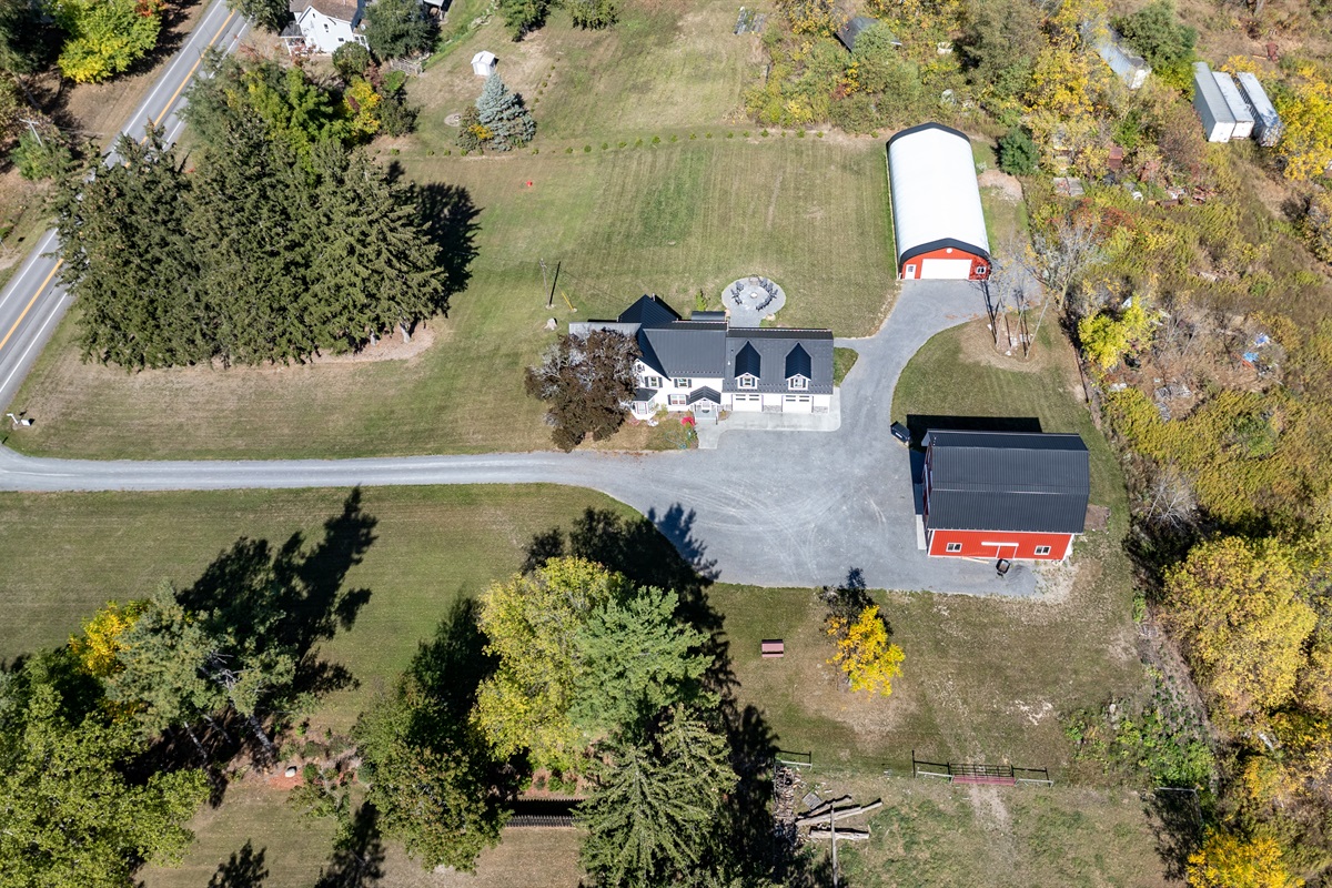 Expansive property with barn and open green space, perfect for family gatherings or group stays
