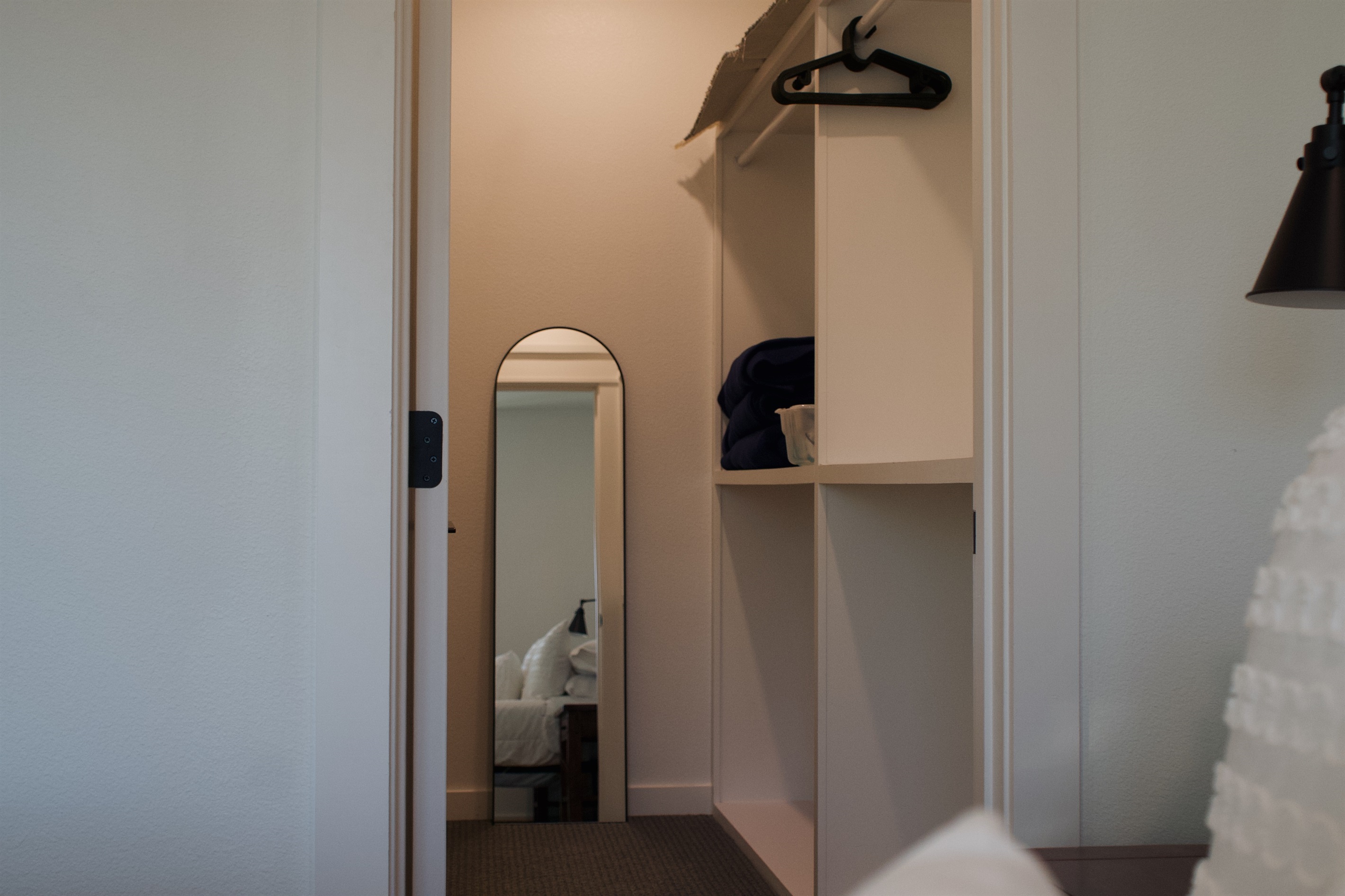 Large closet with generous hanging and storage space, ideal for organizing clothing and luggage during your stay.