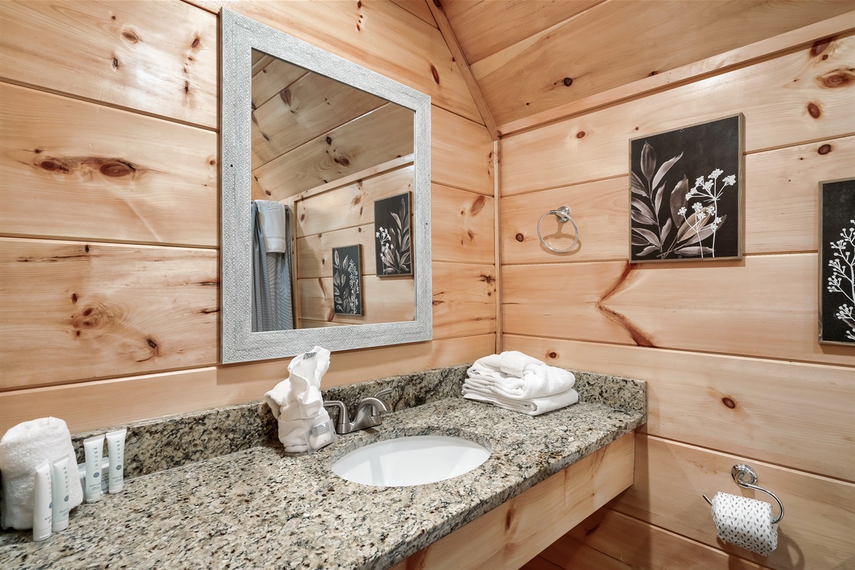 Bathroom with starter supplies and towels. 