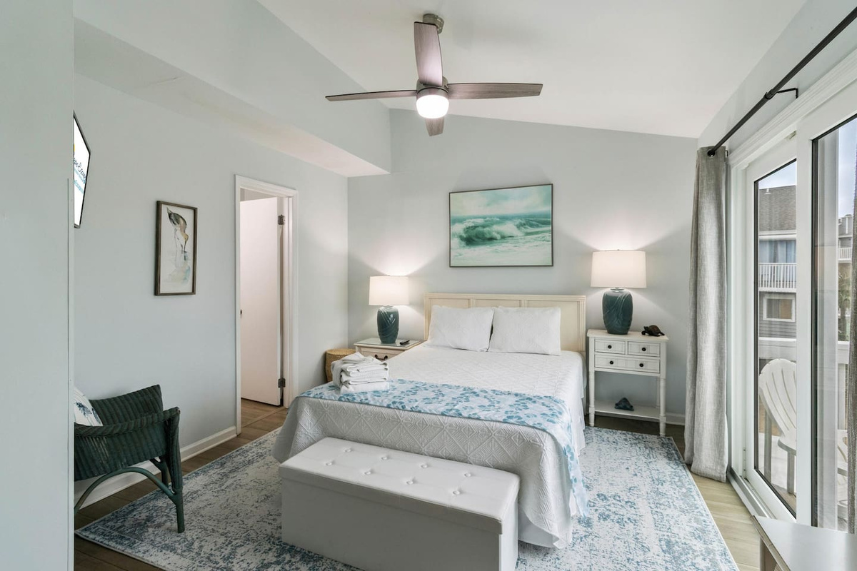 Claim Queen Suite Two &mdash; private balcony, attached bath, Smart TV, and the whole floor to yourselves.