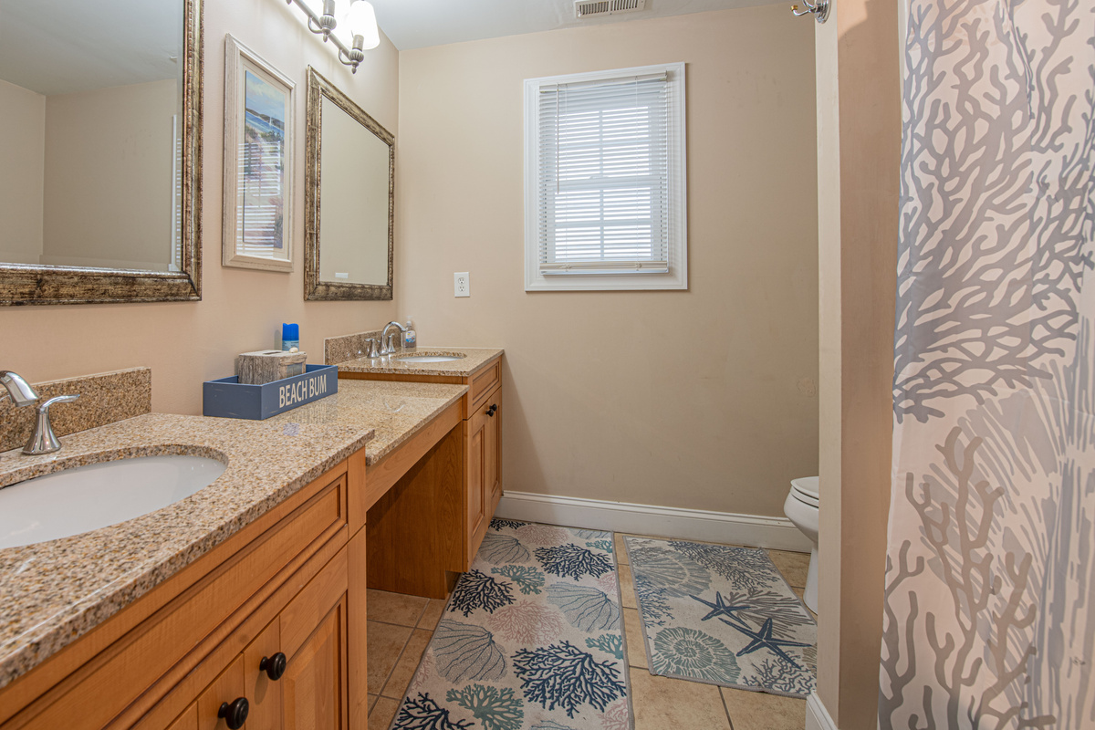 Bathroom 2 with Coral Shower Curtain and Beach Bum Decor
