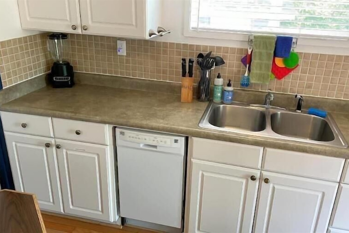 galley kitchen with dishwasher