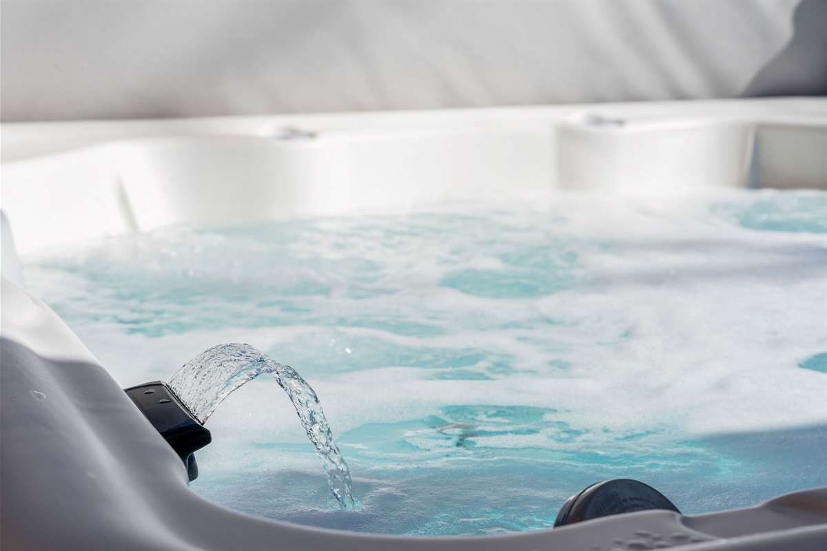 Private hot tub for relaxing evenings, offering comfort and a peaceful escape.