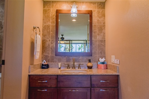 Tiled shower in primary bathroom.