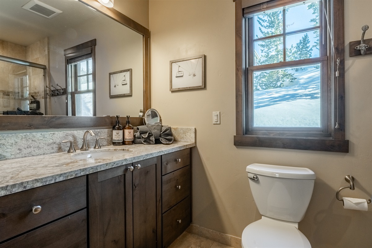 Conveniently located near the Triple Black living area and bunkroom, this full bath with shower/tub combo keeps mornings and evenings simple.