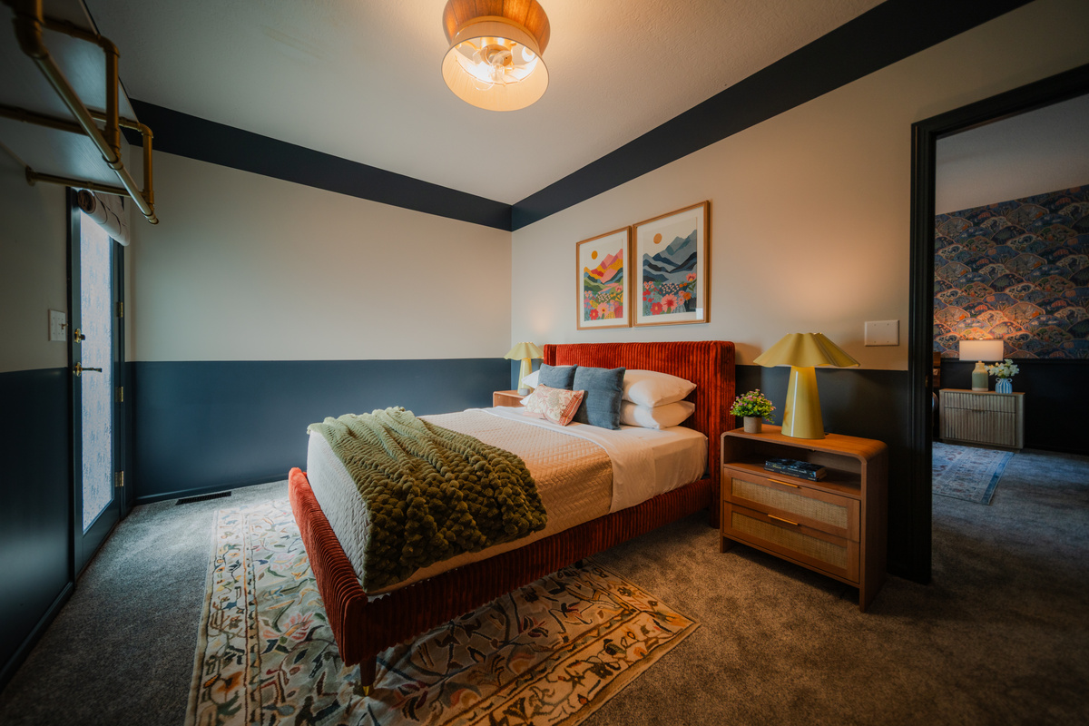 Main-level queen bedroom connected to the master suite.