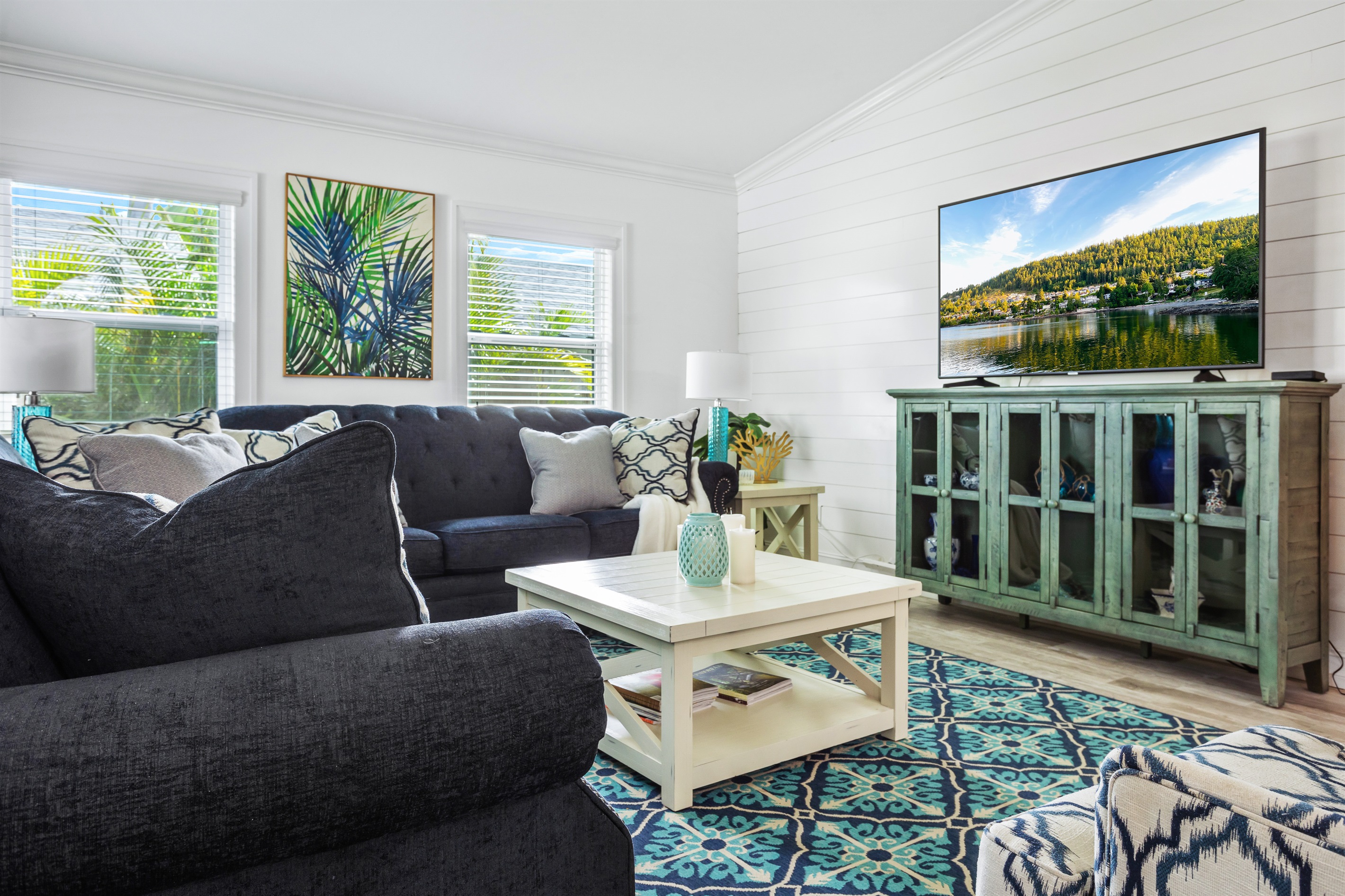Lots of natural light pour into this living room