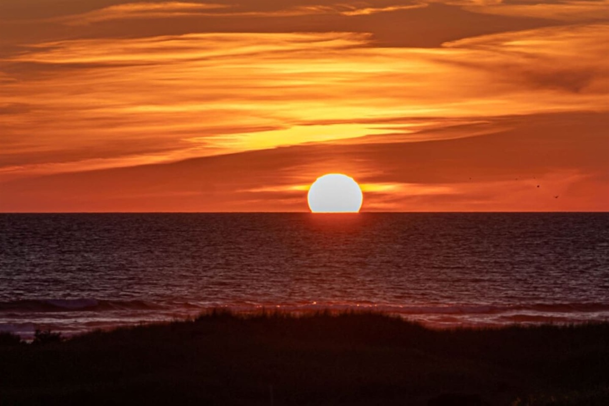 Dazzling sunsets!  Photo taken from top floor deck