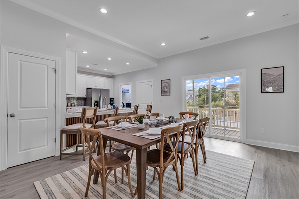 With a generously sized dining table seating 8 and additional seating for 4 at the island, there's room for everyone to come together. Enjoy shared meals and conversations in this welcoming space. 🍽️✨ #GatherRound #FamilyFeast