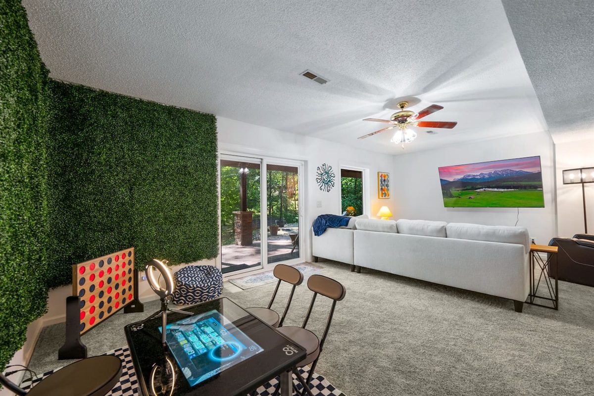 2nd living room located downstairs Infinity Game TableFlat Screen TvPlush Sectional 