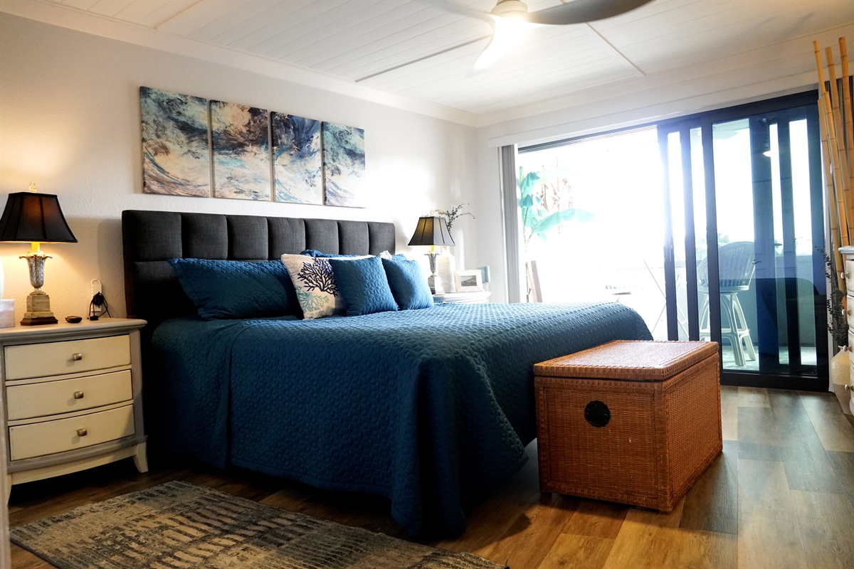 Spacious bedroom with smart TV and direct access to the lanai.