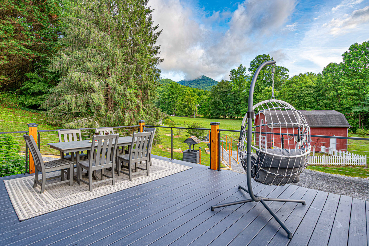 Enjoy breathtaking mountain views from your stylish deck dining set!
