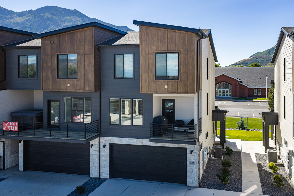 Powderline Lodge welcomes you with a clean, modern exterior and private garage parking.