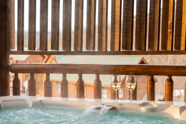 Melt the day away in your own covered, private hot tub.