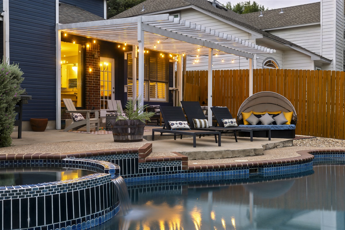 Daybed, pool lounger, spa and twinkle lights